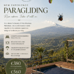 Paragliding in Sicily: Vista Alcantara's Experience poster featuring a tandem paraglider flying above the Alcantara Valley with Mount Etna in the background, luxury accommodation, breakfast, two massages, and a two-night wellness getaway in Sicily.