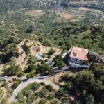 Drone image of Vista Alcantara on a mountain top in Sicily.