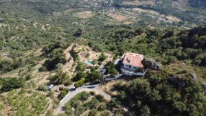 Drone image of Vista Alcantara on a mountain top in Sicily.