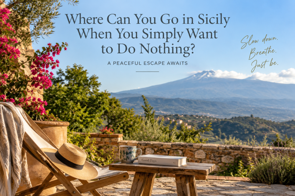 Peaceful mountain-top view from Vista Alcantara in rural Sicily, overlooking the Alcantara Valley and surrounding countryside, offering a quiet and secluded escape.